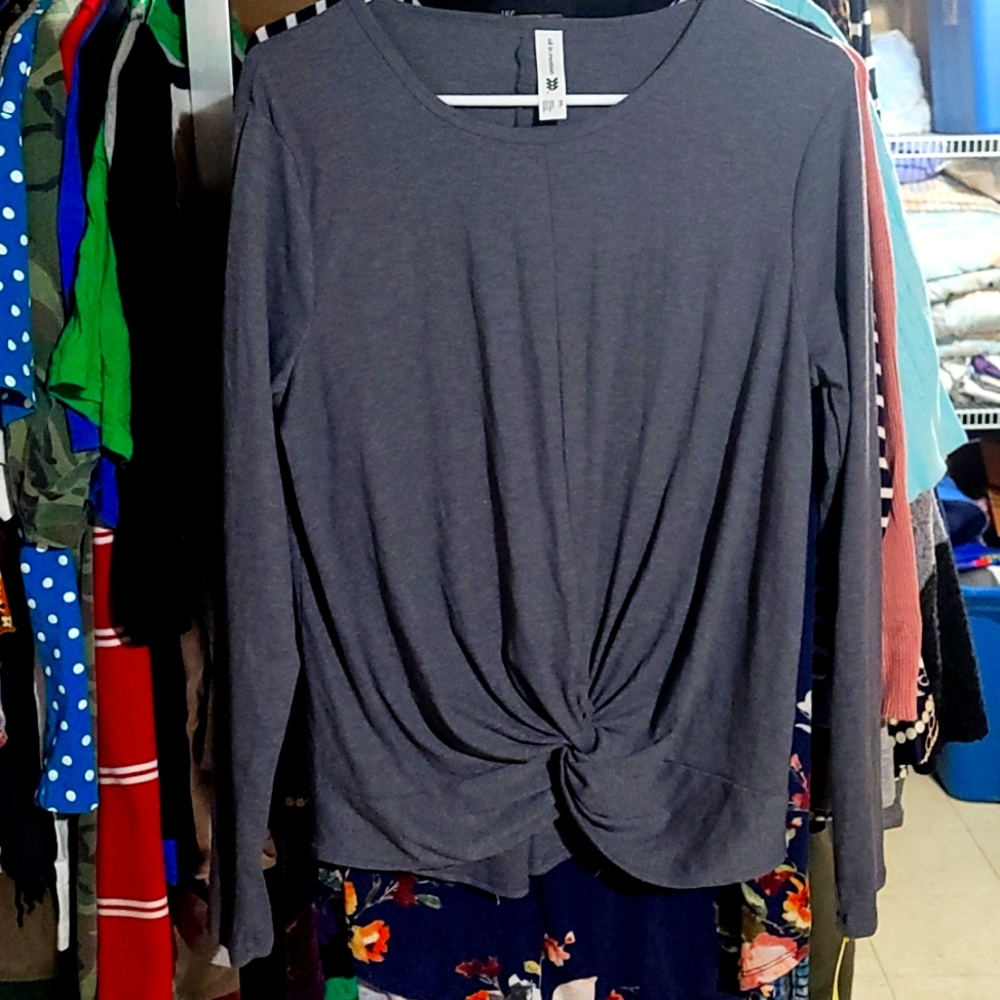 moisture wicking, twist up center shirt